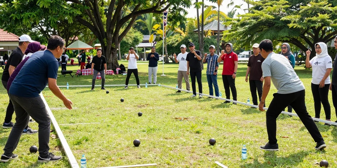 Permainan petanque di fopikotakendari.org, kelompok beragam pemain bersenang-senang di taman.