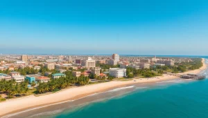 Mogadishu km square features an aerial view highlighting vibrant coastal architecture and lush landscapes.